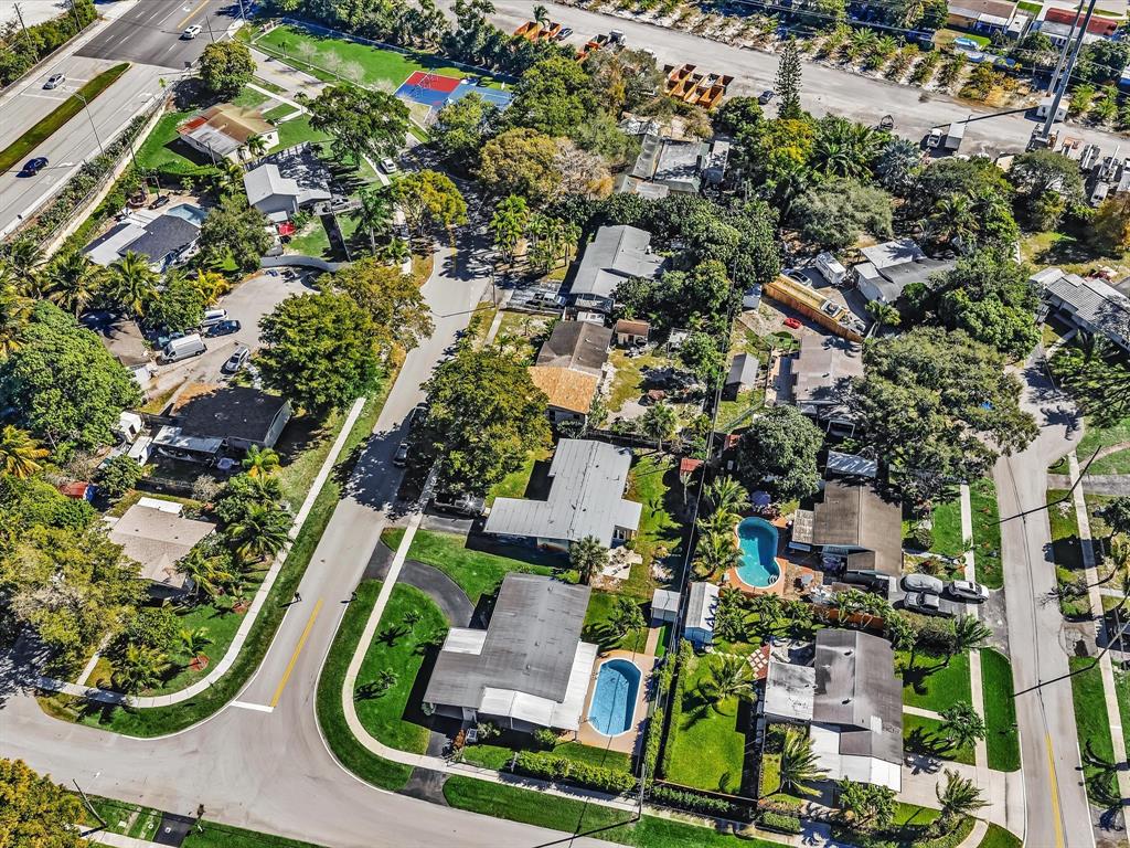 5180 Southwest 13th Street Plantation, FL 33317 - Photo 48 of 54 an aerial view of residential houses with outdoor space