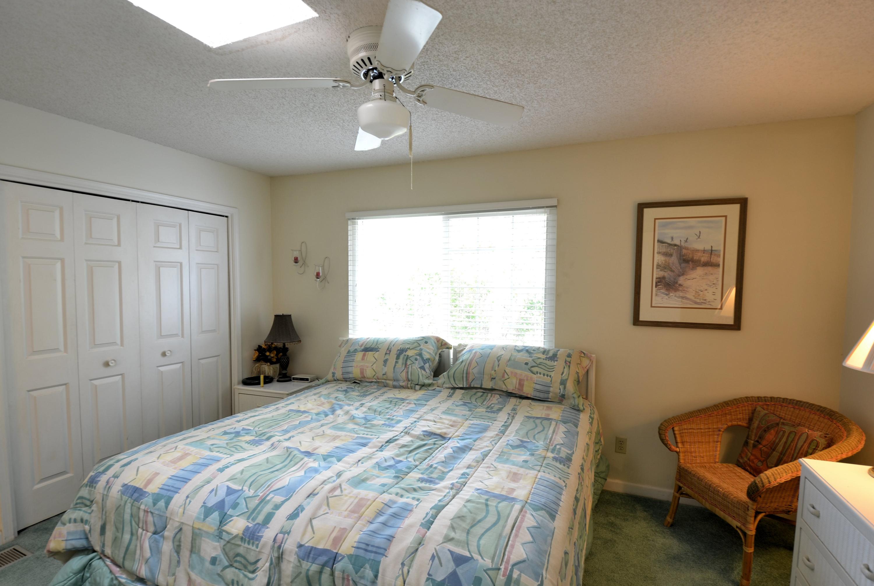 241 Ellis Road, Unit 29 Miramar Beach, FL 32550 - Photo 15 of 19 a bedroom with a bed and window