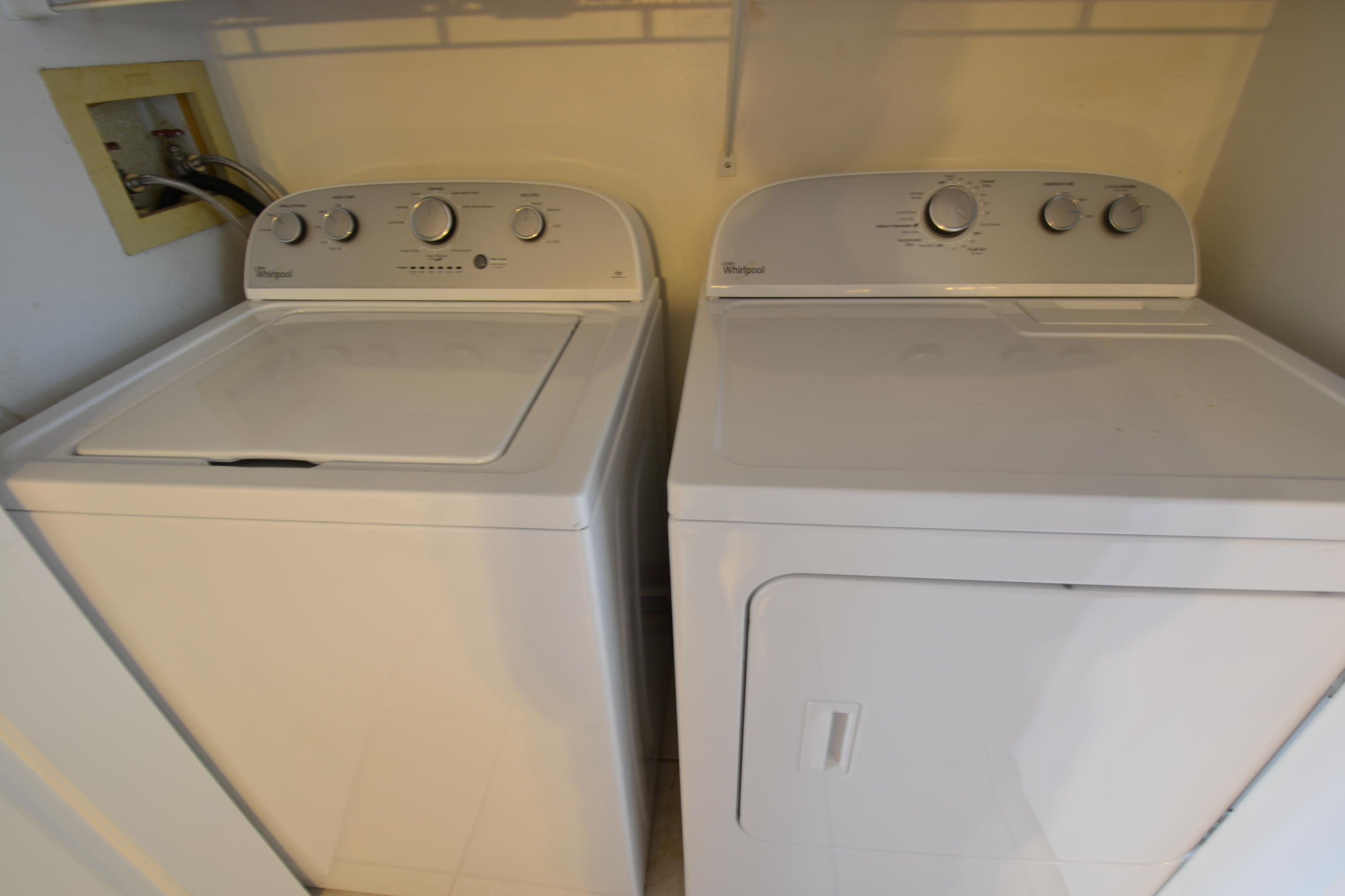 241 Ellis Road, Unit 29 Miramar Beach, FL 32550 - Photo 18 of 19 a utility room with dryer and washer