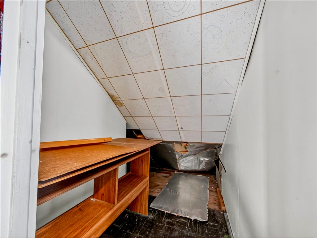 28 Penrose Street Rochester, NY 14612 - Photo 29 of 42 Attic space between the 2 bedrooms on the