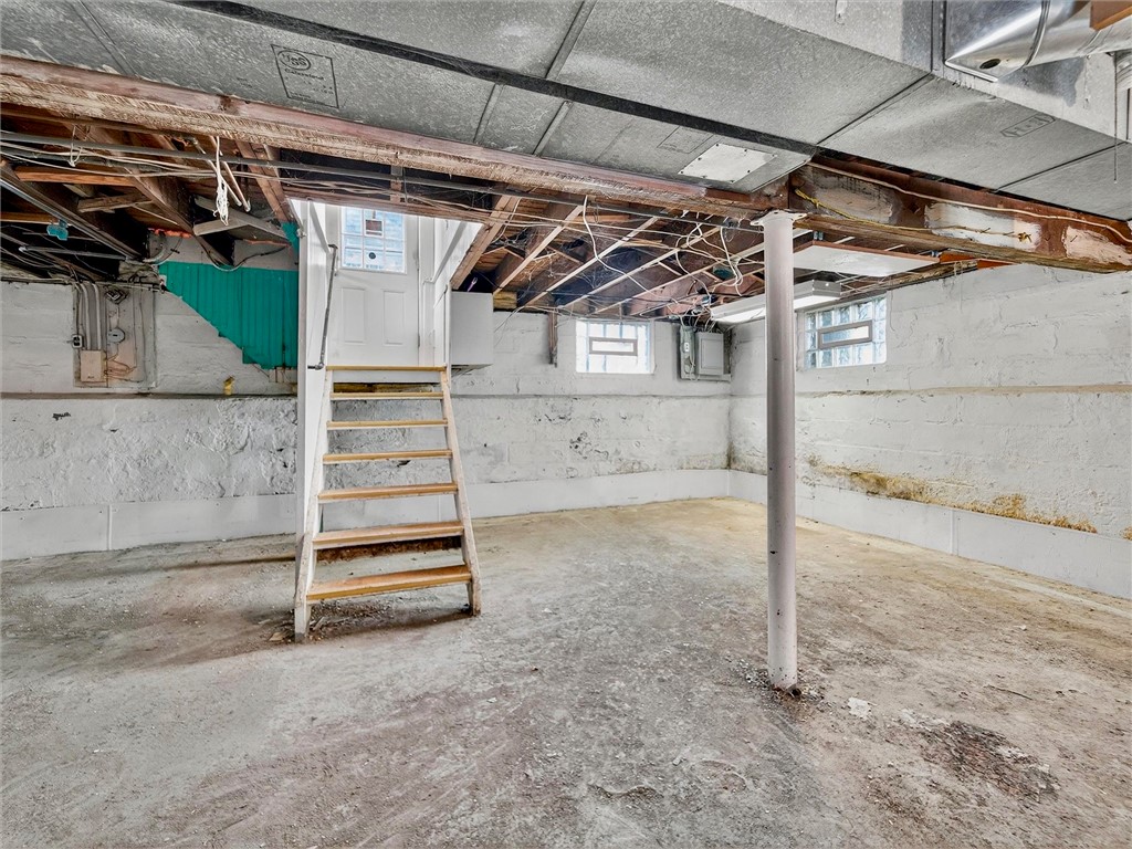 28 Penrose Street Rochester, NY 14612 - Photo 32 of 42 Large basement with water proofing system in place