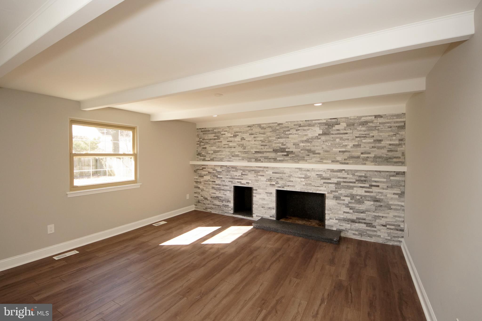 109 Coopers Kill Road Delran, NJ 08075 - Photo 13 of 35 wooden floor fireplace and windows in an empty room