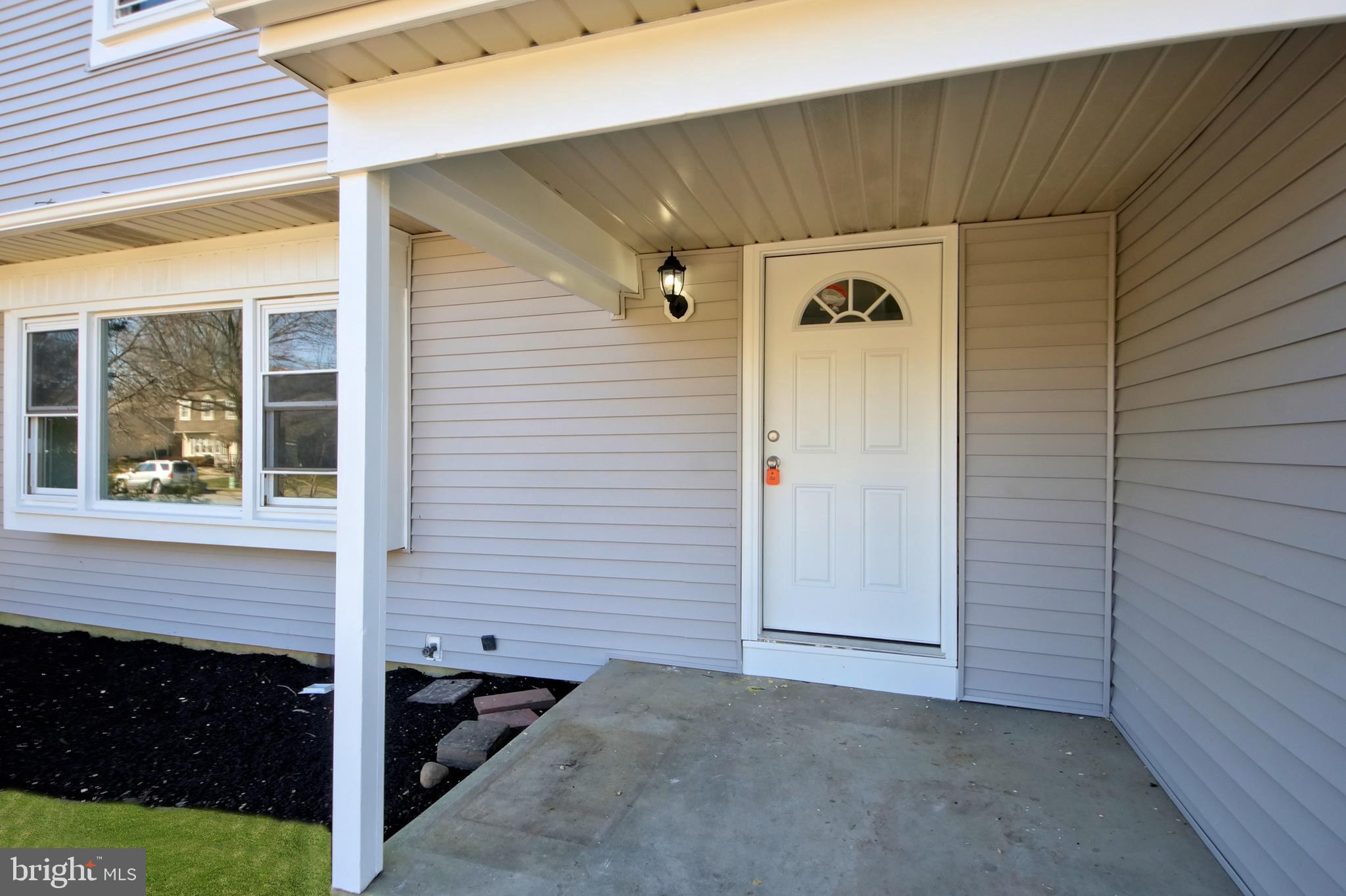 109 Coopers Kill Road Delran, NJ 08075 - Photo 3 of 35 a view of a porch with a door and a fireplace