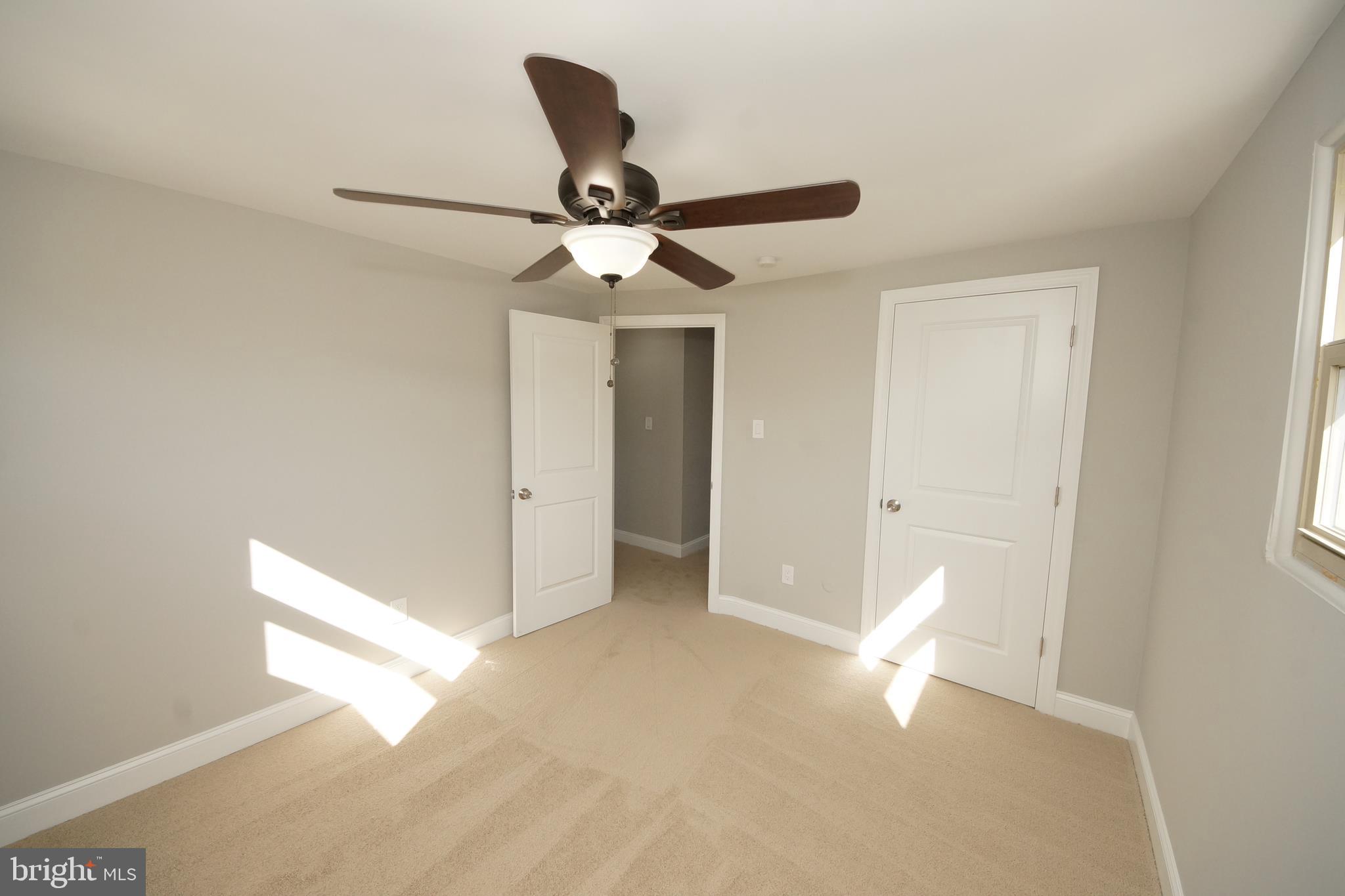 109 Coopers Kill Road Delran, NJ 08075 - Photo 24 of 35 a view of a livingroom with a ceiling fan and window