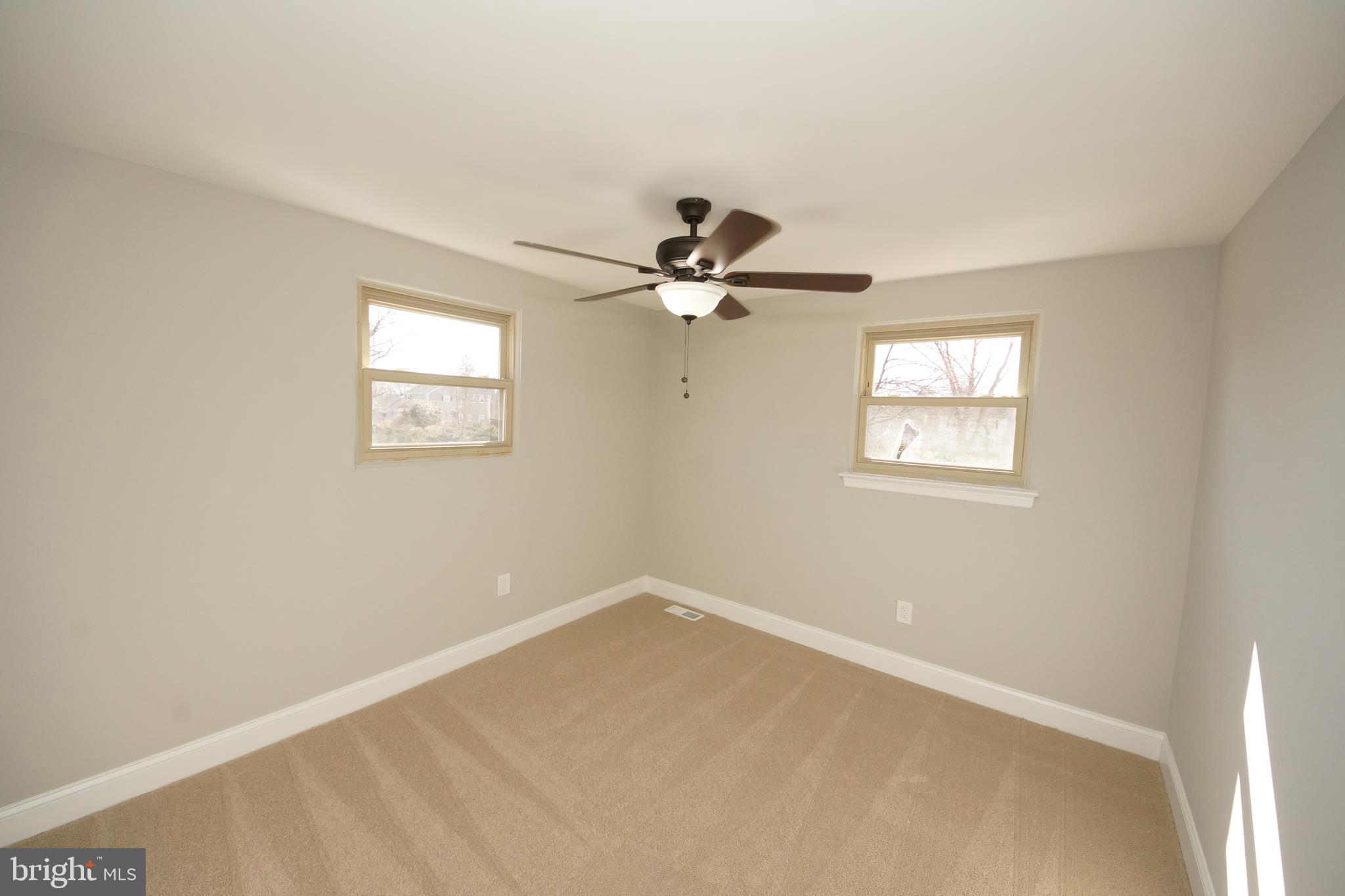 109 Coopers Kill Road Delran, NJ 08075 - Photo 25 of 35 wooden floor in an empty room with a window