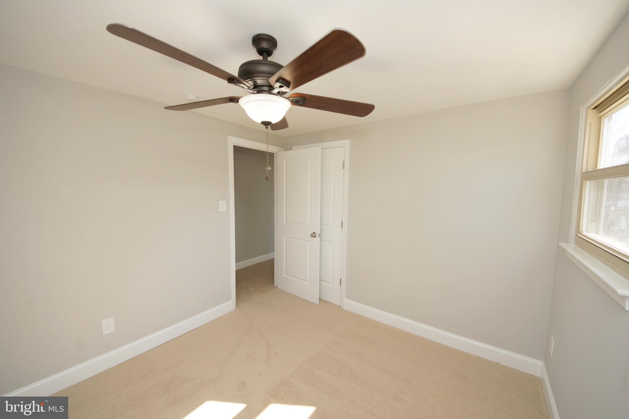 109 Coopers Kill Road Delran, NJ 08075 - Photo 26 of 35 an empty room with windows and fan
