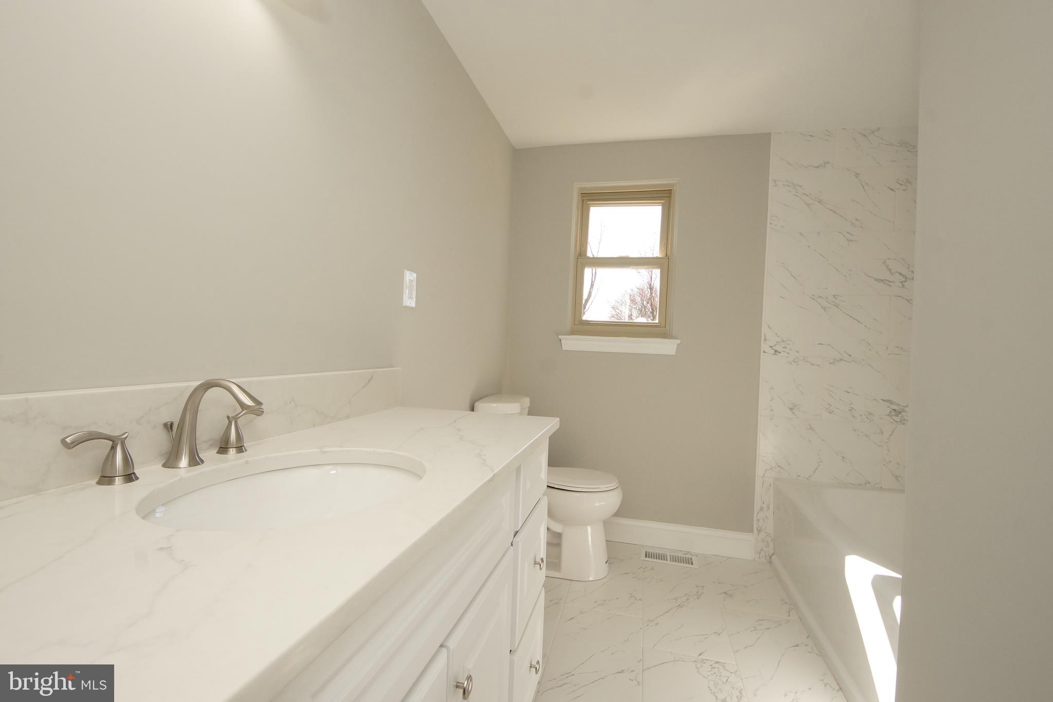 109 Coopers Kill Road Delran, NJ 08075 - Photo 29 of 35 a bathroom with a sink toilet and vanity