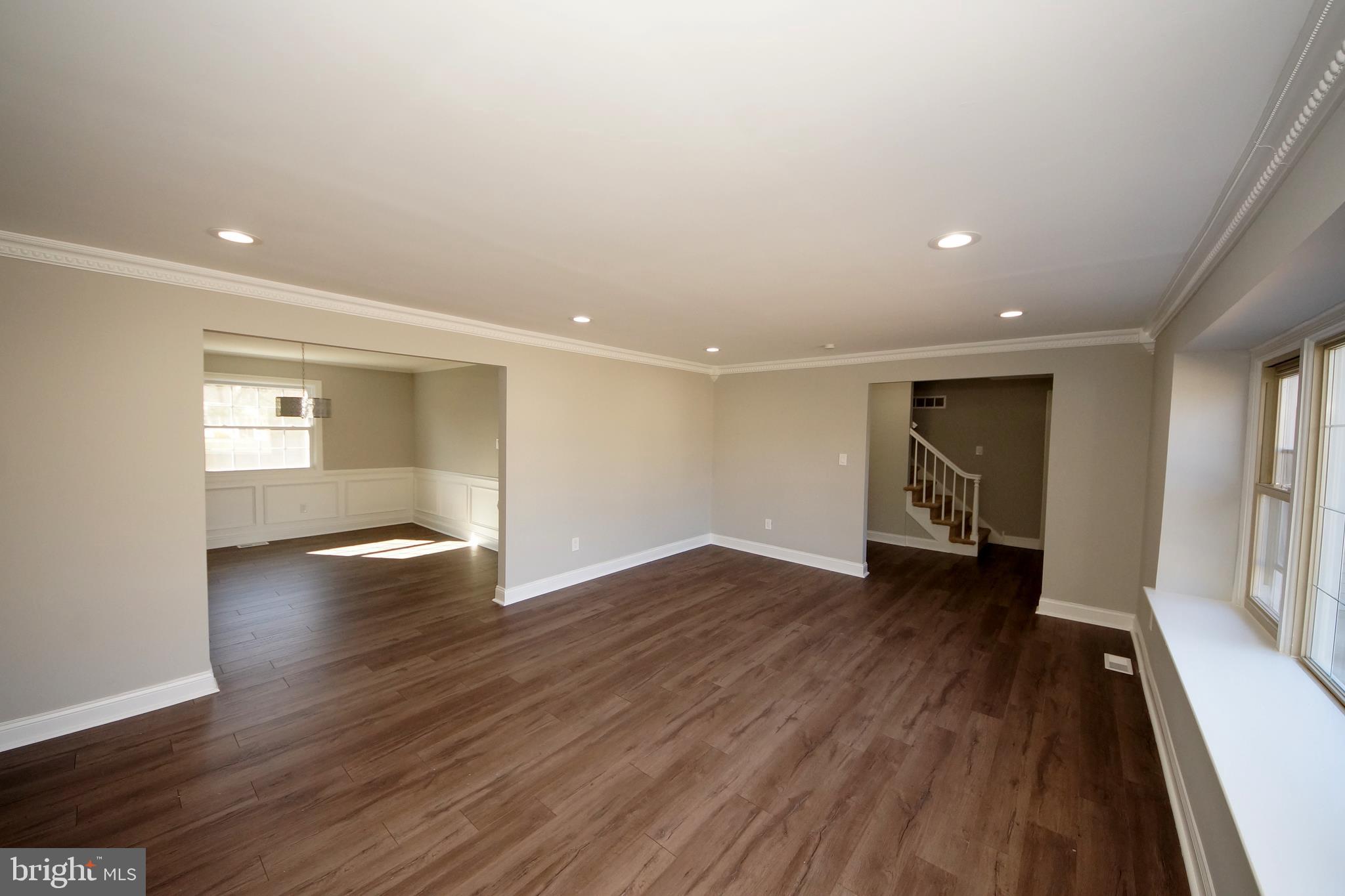 109 Coopers Kill Road Delran, NJ 08075 - Photo 5 of 35 an empty room with wooden floor and windows