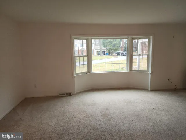 an empty room with a window