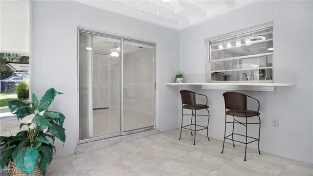 a view of a chair and table in a room