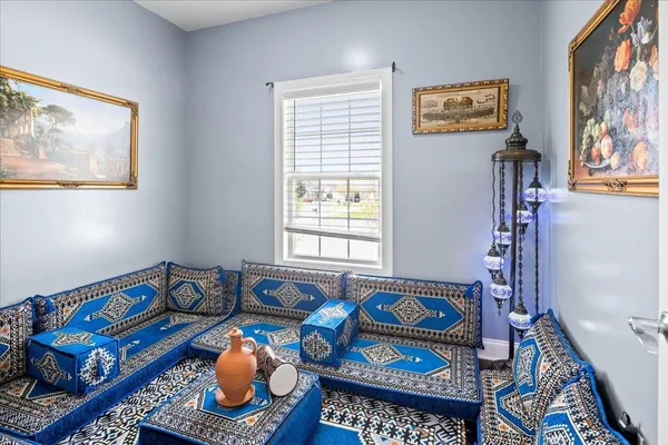 a kitchen with stainless steel appliances kitchen island granite countertop a refrigerator and a stove top oven