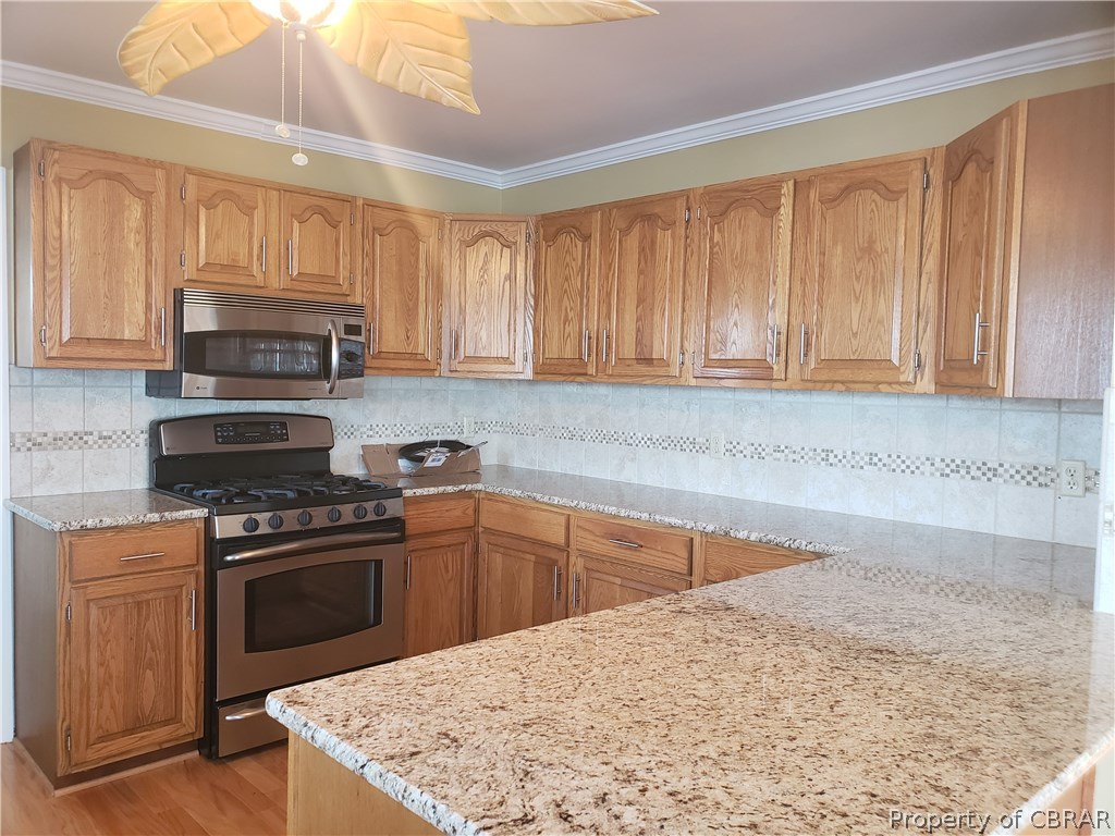 589 Brandon Point Road Locust Hill, VA 23092 - Photo 13 of 39 Door to left enters Laundry Room with Pantry.