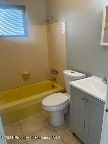 a bathroom with a toilet and a sink