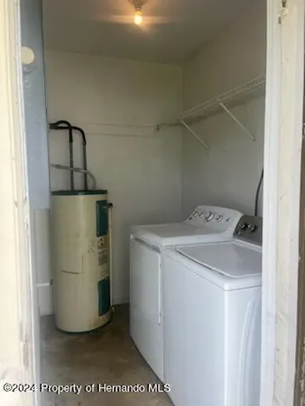 a utility room with a washer and dryer