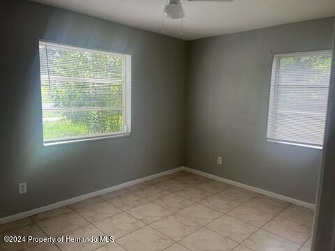 7054 Fireside Street Spring Hill, FL 34606 - Photo 6 of 17 a view of room with window