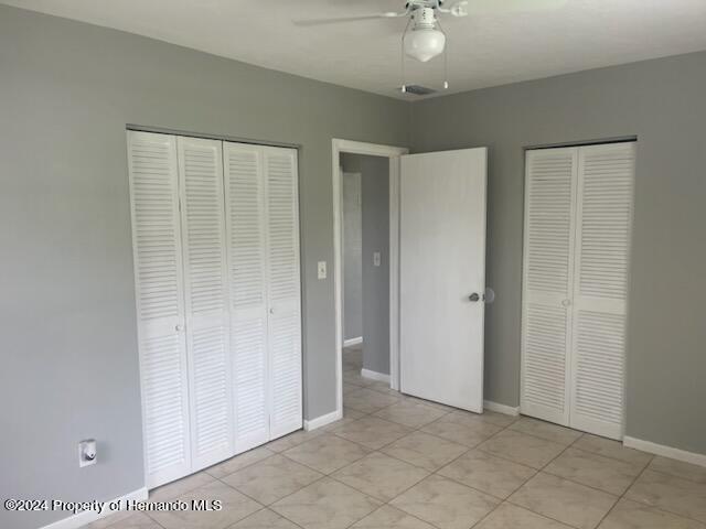 7054 Fireside Street Spring Hill, FL 34606 - Photo 7 of 17 a view of an empty room with a bathroom