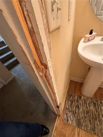 a bathroom with a sink and a mirror