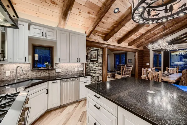 a living room with a couch and a window