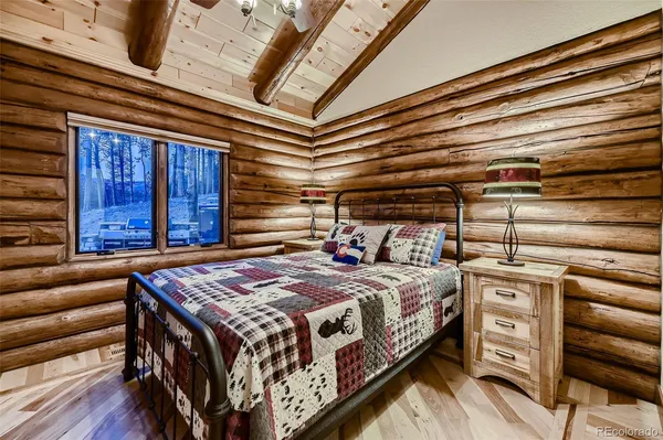 a living room with furniture and a piano