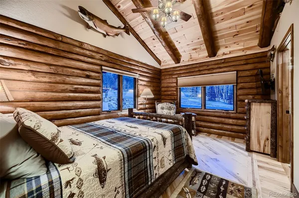 an open kitchen with a table and chairs