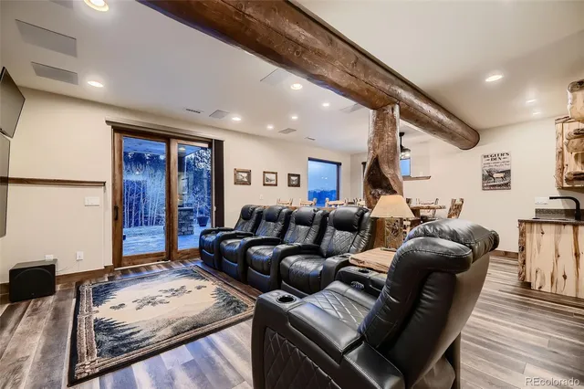 a big room with closet and a chandelier