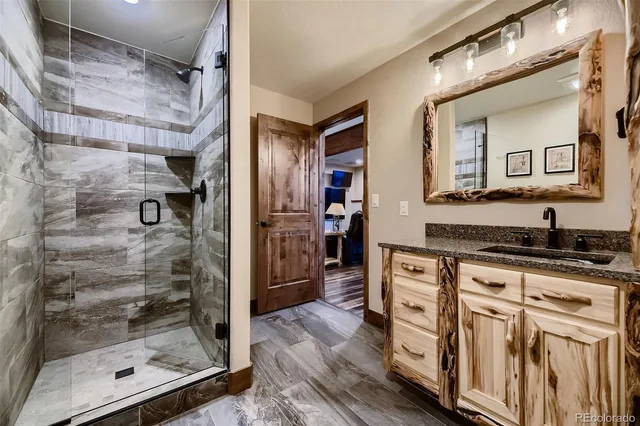 a kitchen with stainless steel appliances a sink stove and refrigerator