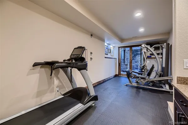 a kitchen with stainless steel appliances a sink stove and refrigerator