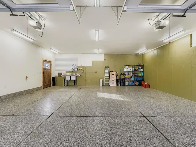 a big room with closet and a large window