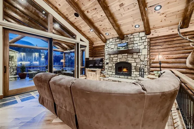 a kitchen with stainless steel appliances granite countertop a stove and cabinets