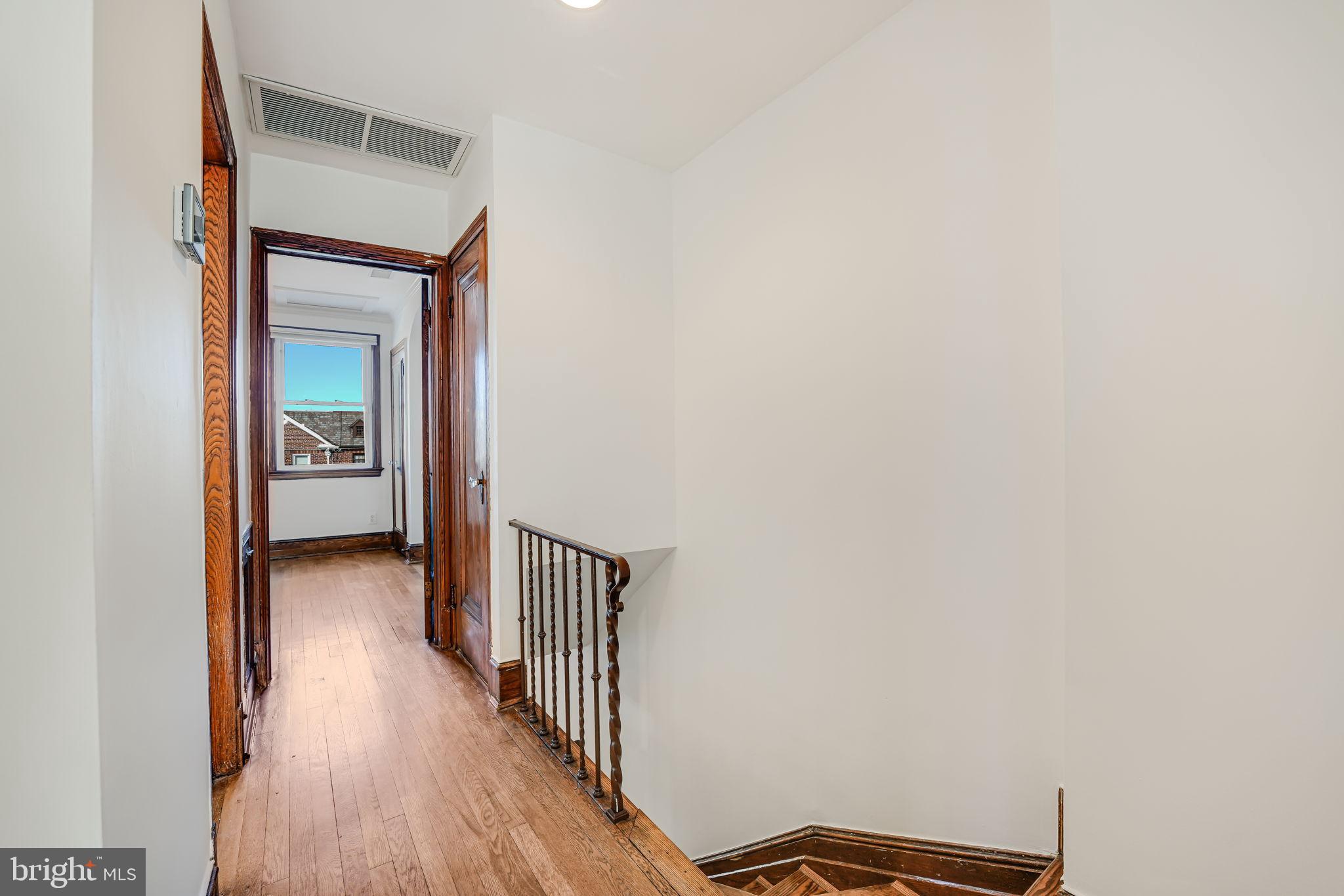 1304 Rittenhouse Street Northwest Washington, DC 20011 - Photo 22 of 50 a view of a hallway with wooden floor