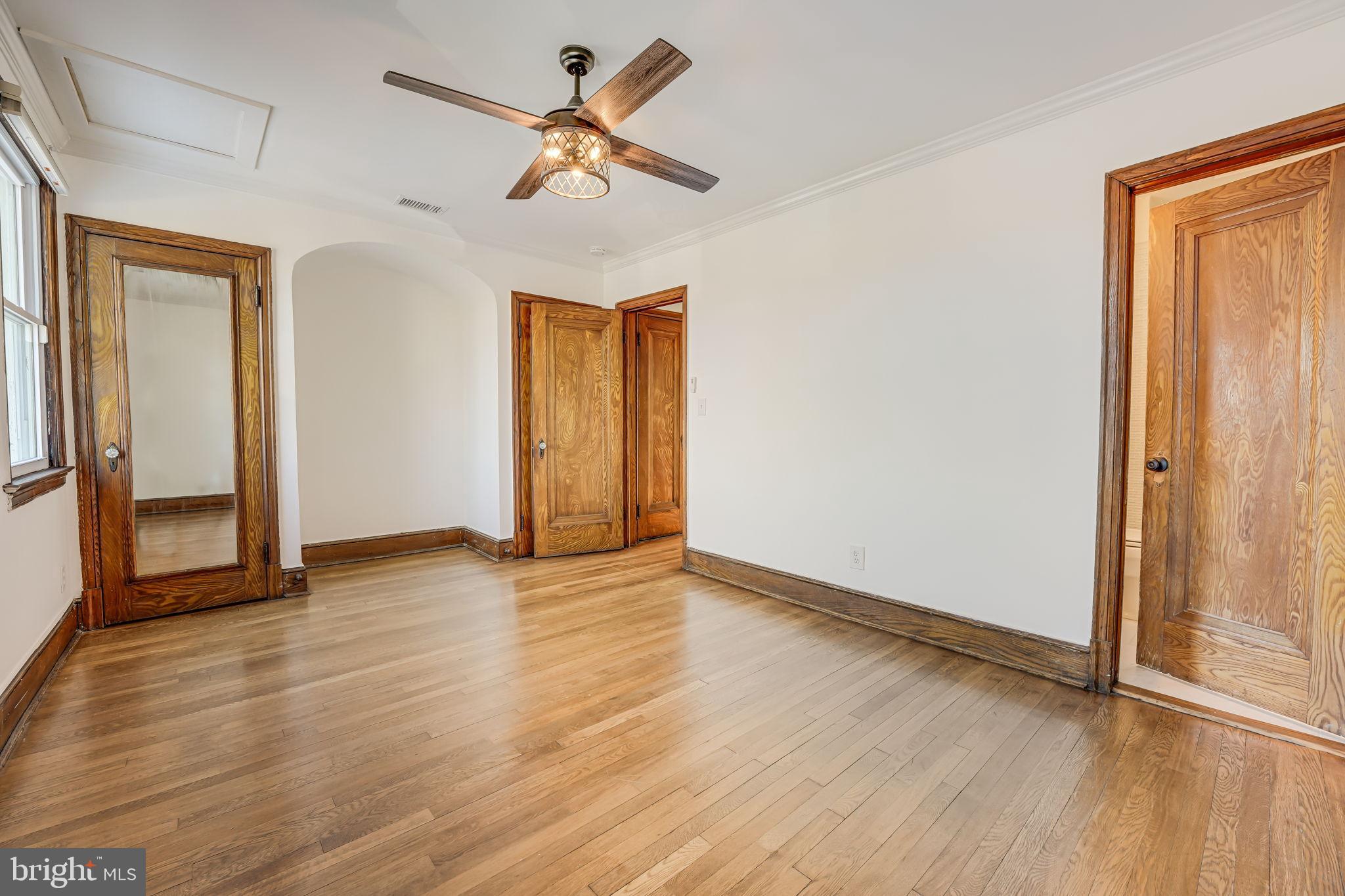 1304 Rittenhouse Street Northwest Washington, DC 20011 - Photo 28 of 50 wooden floor in an empty room with a window