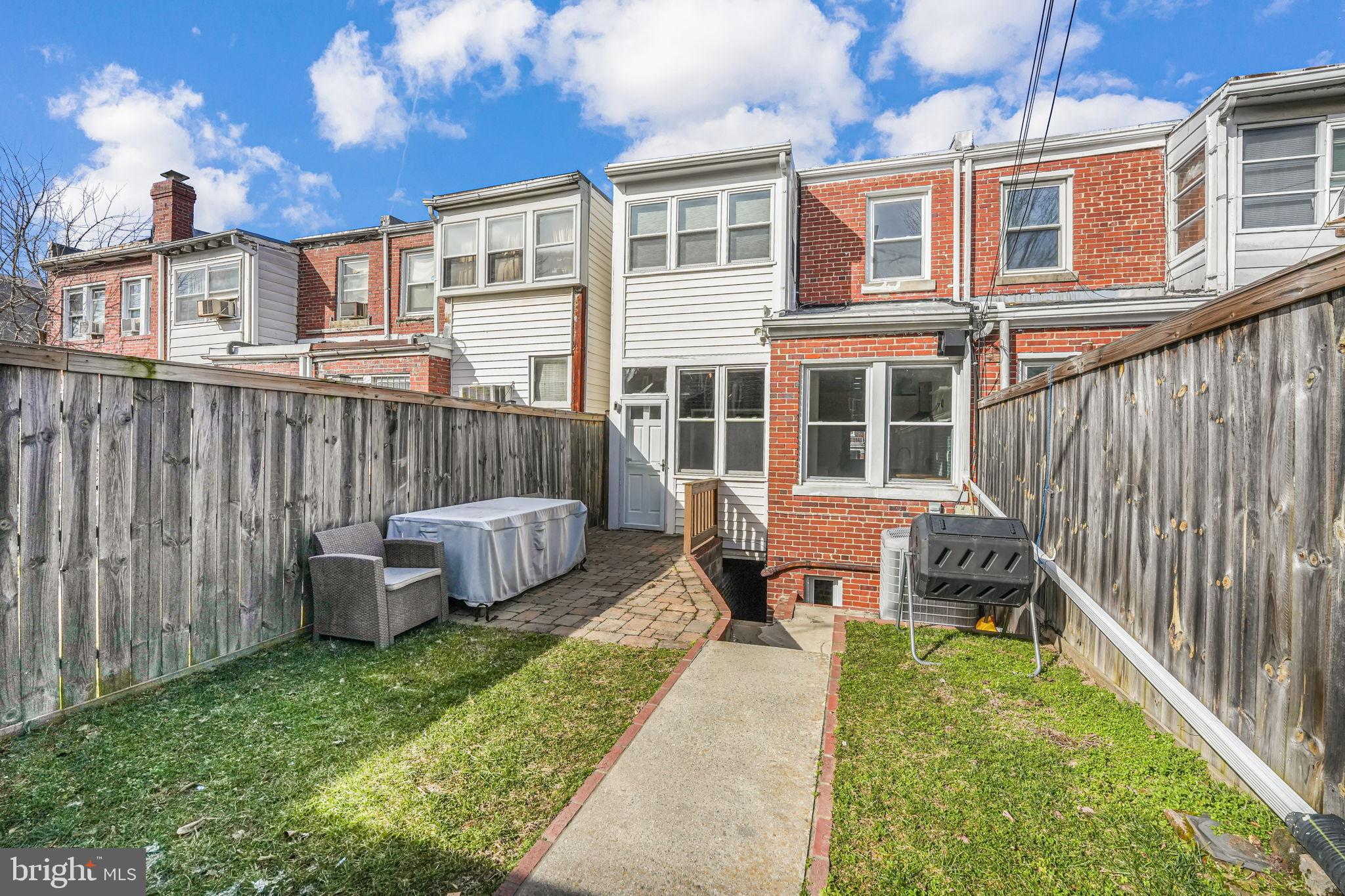 1304 Rittenhouse Street Northwest Washington, DC 20011 - Photo 46 of 50 a view of a house with backyard and sitting area