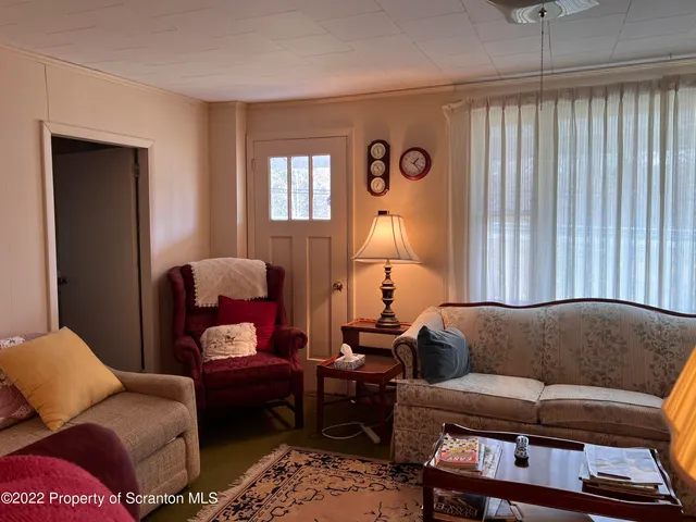 a view of a street with a building in the background