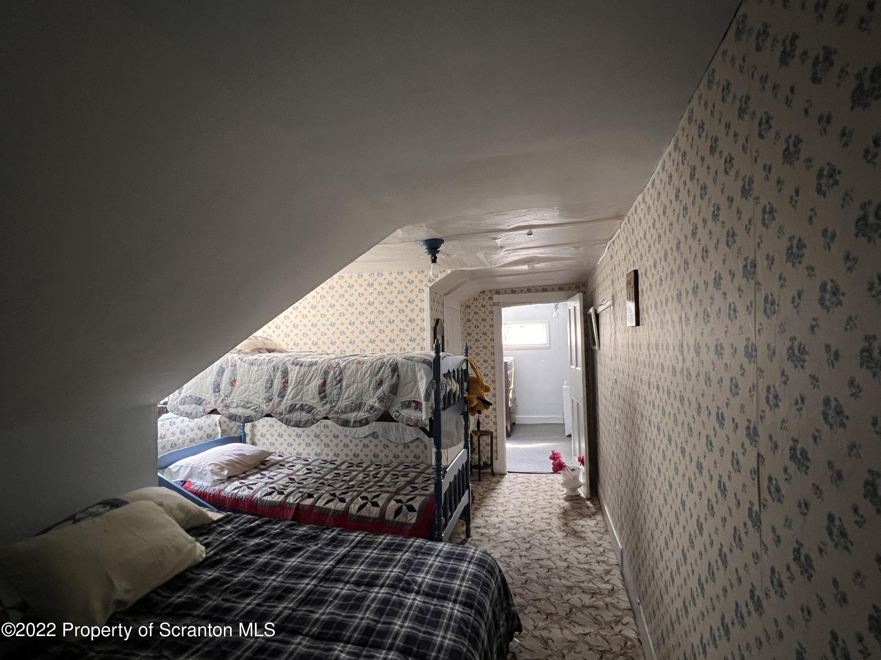 South Main Street Union Dale, PA 18470 - Photo 31 of 47 a bedroom with a bed and a window