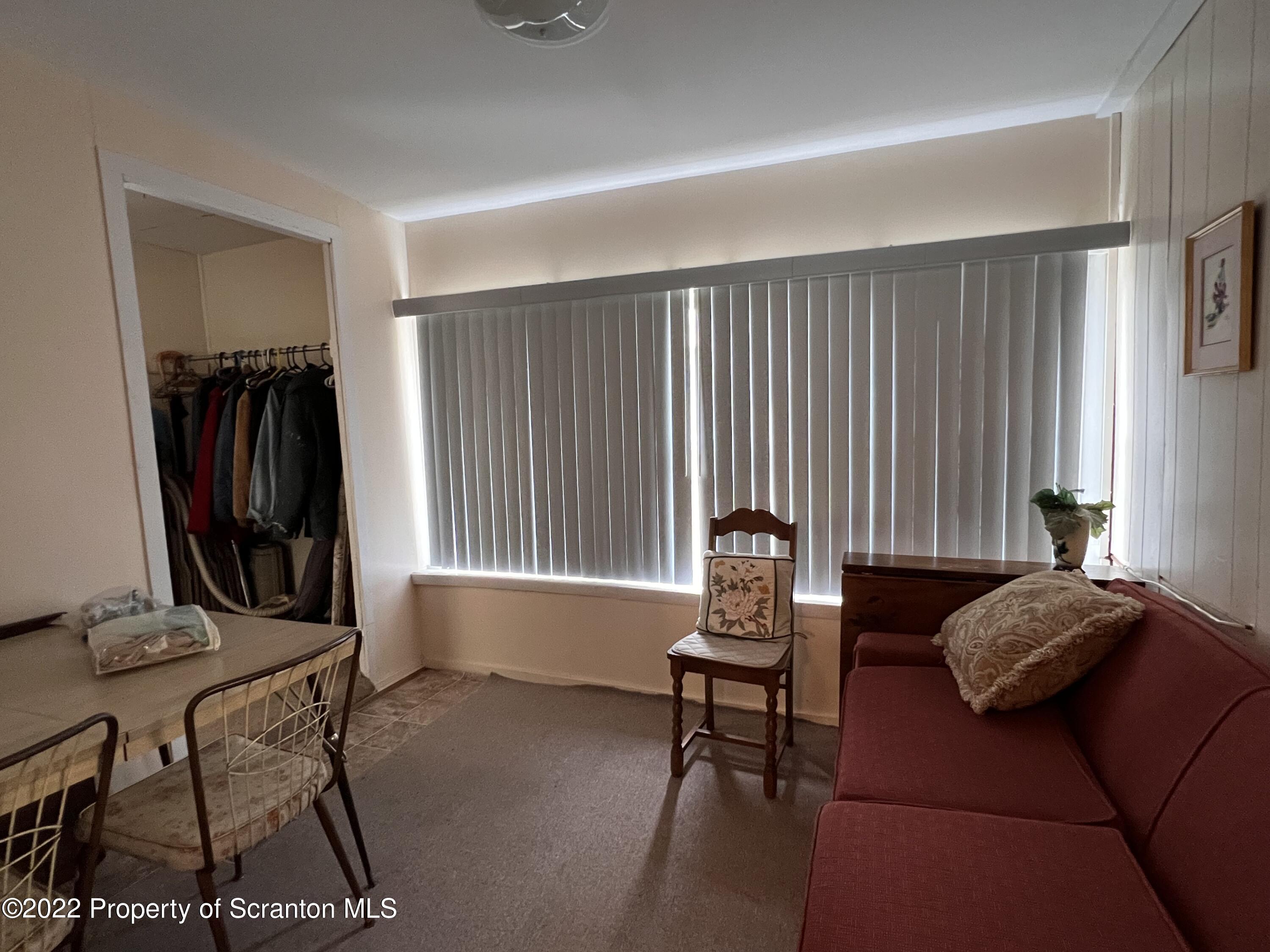 South Main Street Union Dale, PA 18470 - Photo 34 of 47 a living room with furniture a window and a flat screen tv