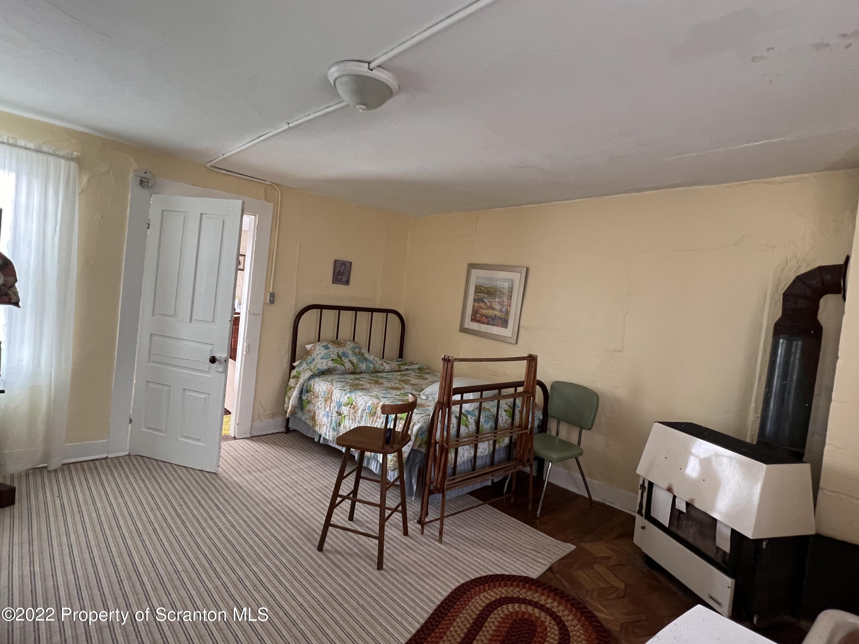 South Main Street Union Dale, PA 18470 - Photo 40 of 47 a living room with furniture and a wooden floor