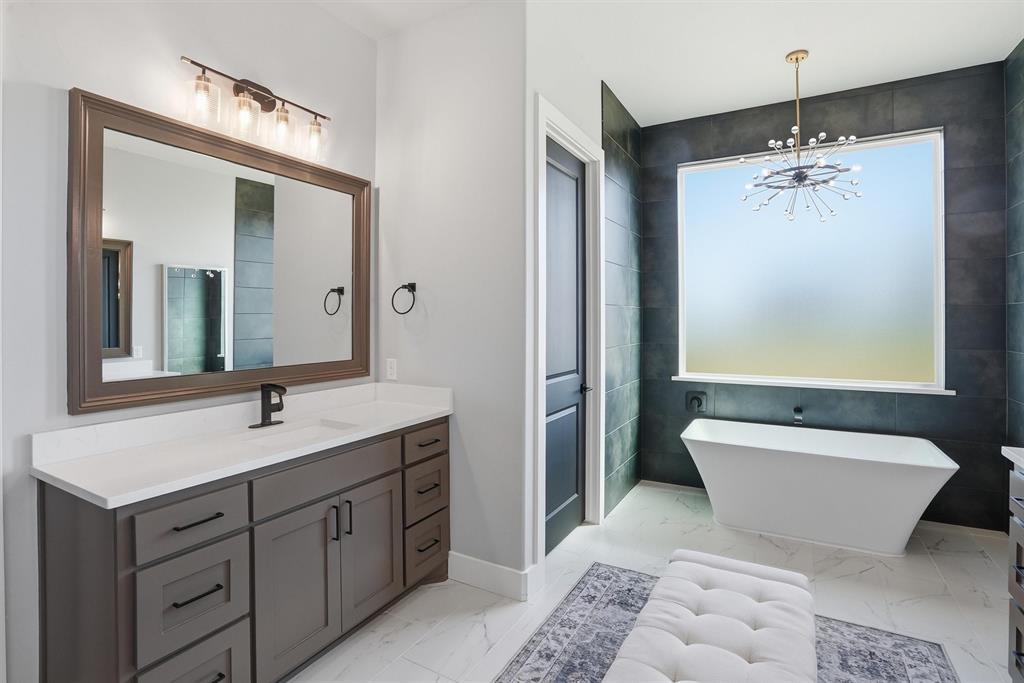 6620 Buffalo Ridge Circle Godley, TX 76044 - Photo 24 of 40 a bathroom with a toilet sink and mirror