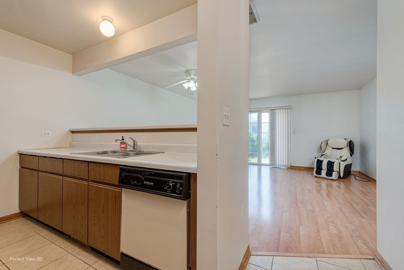 1793 Grove Avenue Schaumburg, IL 60193 - Photo 2 of 16 a kitchen with a sink cabinets and wooden floor