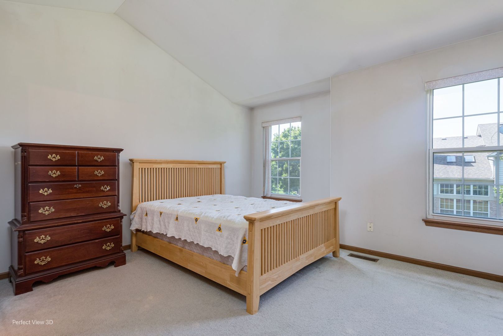 1793 Grove Avenue Schaumburg, IL 60193 - Photo 10 of 16 a bed sitting in a bedroom next to a window