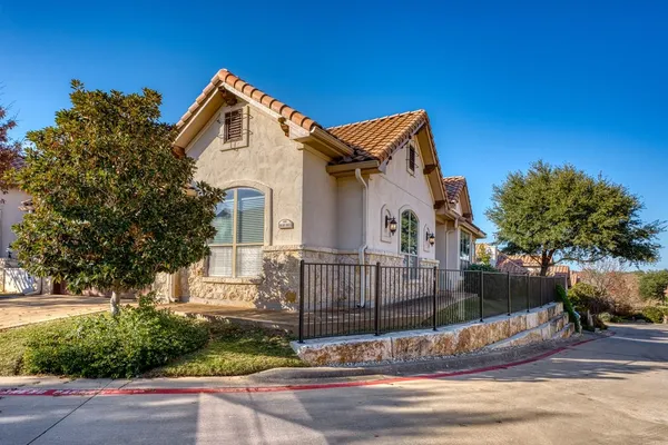 a front view of a house with a garage