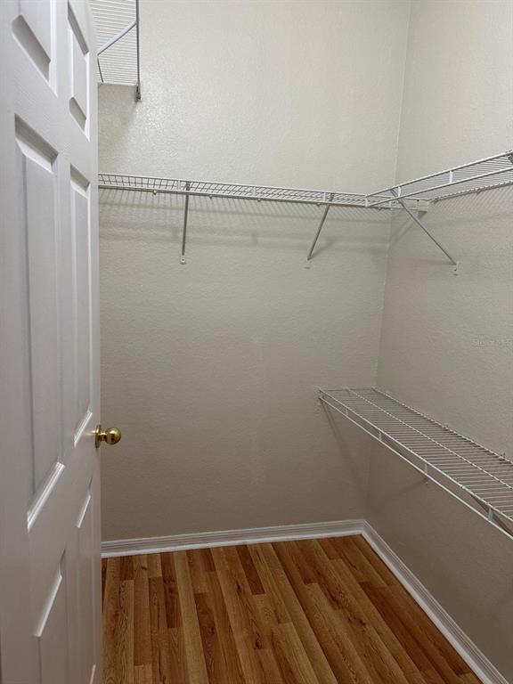 3757 Conroy Road, Unit 2512 Orlando, FL 32839 - Photo 7 of 13 a view of a room with racks on the wall