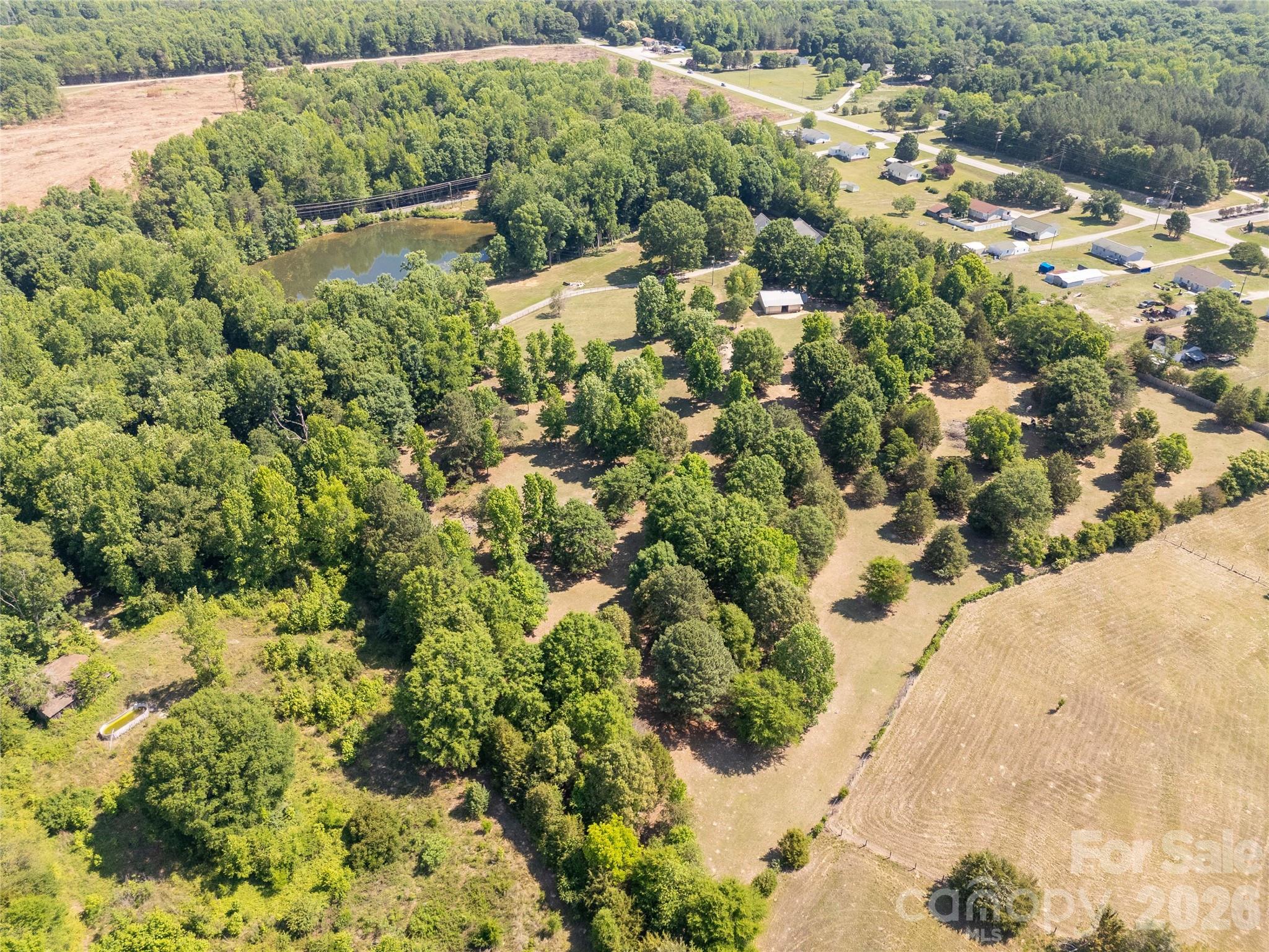 1845 State Rd S-46-149 Clover, SC 29710 - Photo 4 of 28 a view of a yard with a tree
