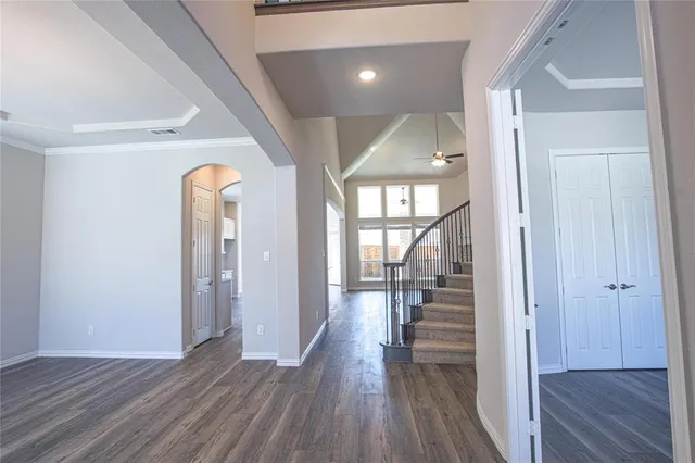 wooden floor and an entryway with a hardwood floor