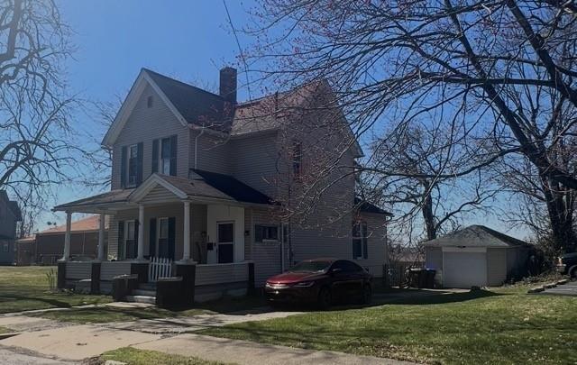 59 Elm Avenue Sharon, PA 16146 - Photo 1 of 2 a front view of house with a garden
