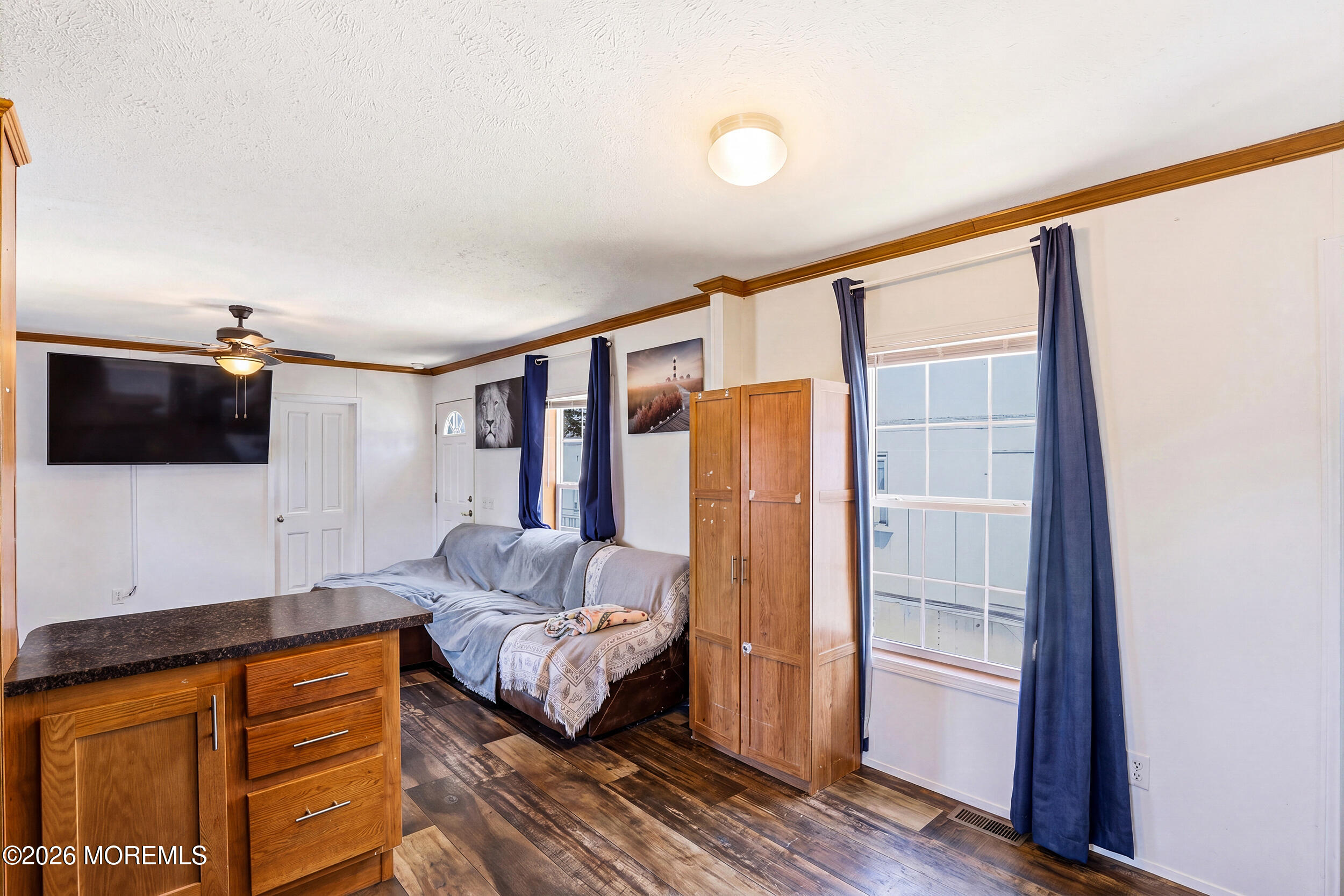 40 Locust Grove Hazlet, NJ 07730 - Photo 6 of 15 a bedroom with furniture and a flat screen tv