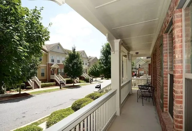 a view of a street with sitting area