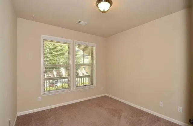 an empty room with windows