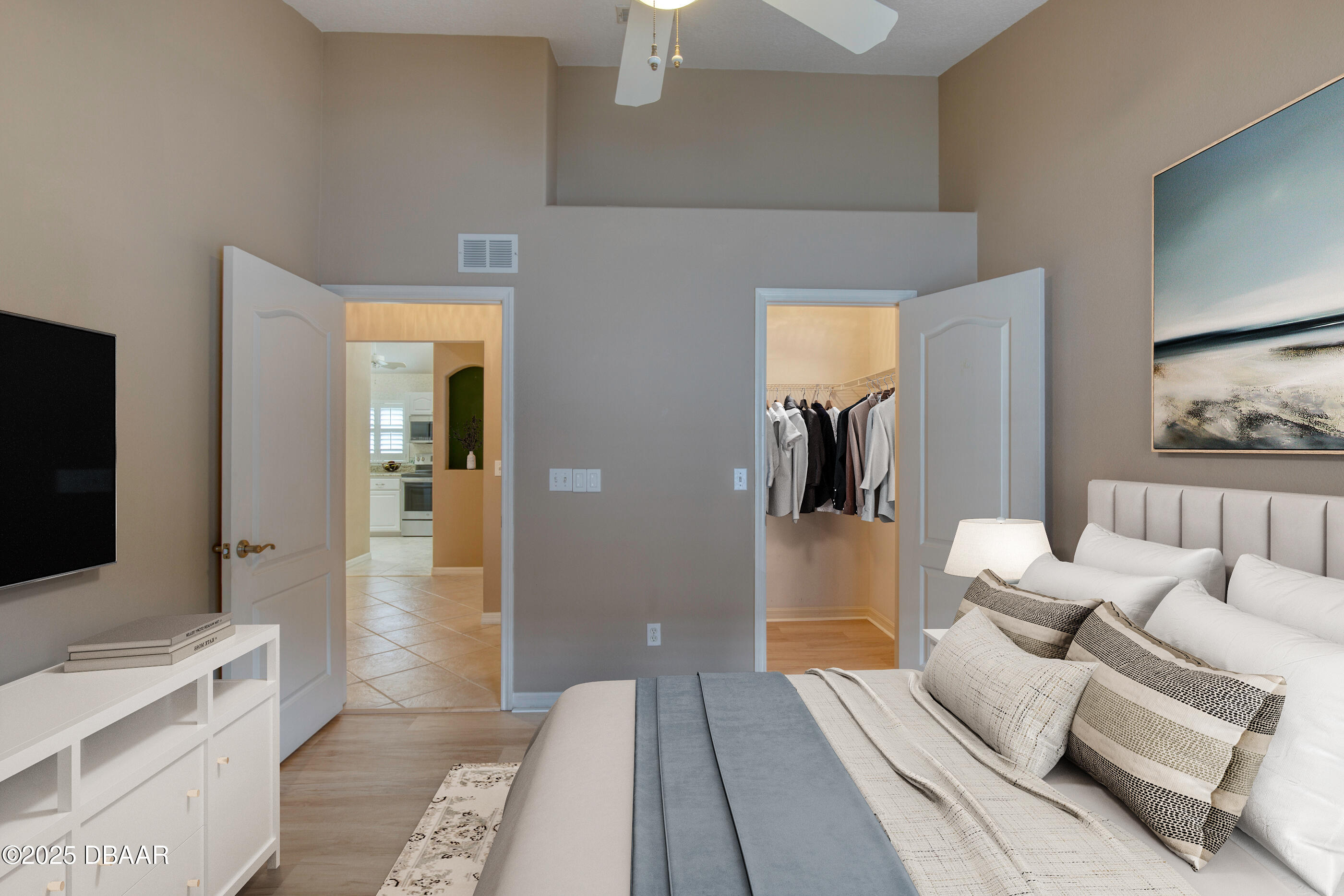 38 Lake Walden Trail Ormond Beach, FL 32174 - Photo 27 of 72 a bedroom with furniture and a flat screen tv