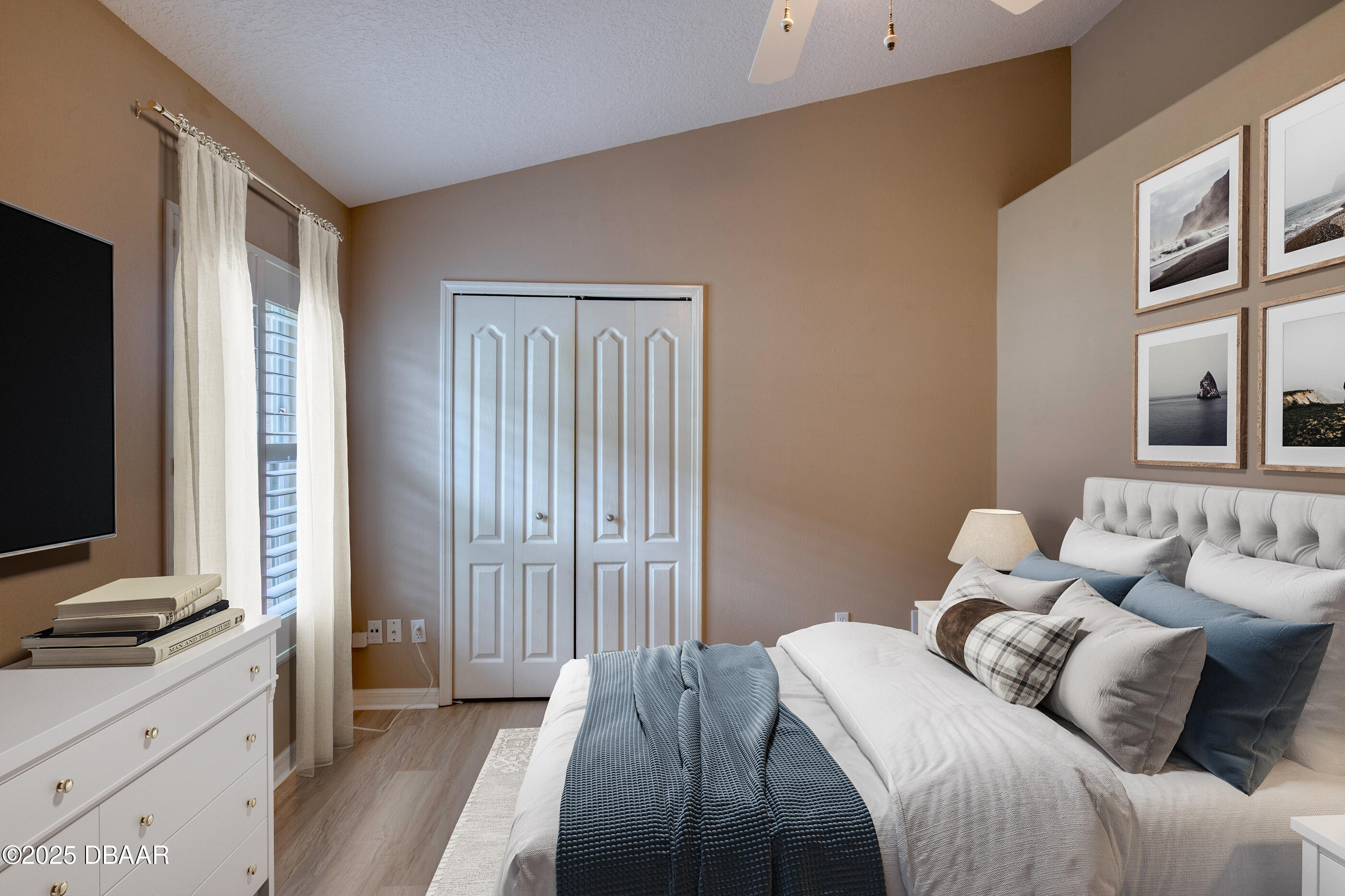 38 Lake Walden Trail Ormond Beach, FL 32174 - Photo 32 of 72 a bedroom with a bed and a flat screen tv