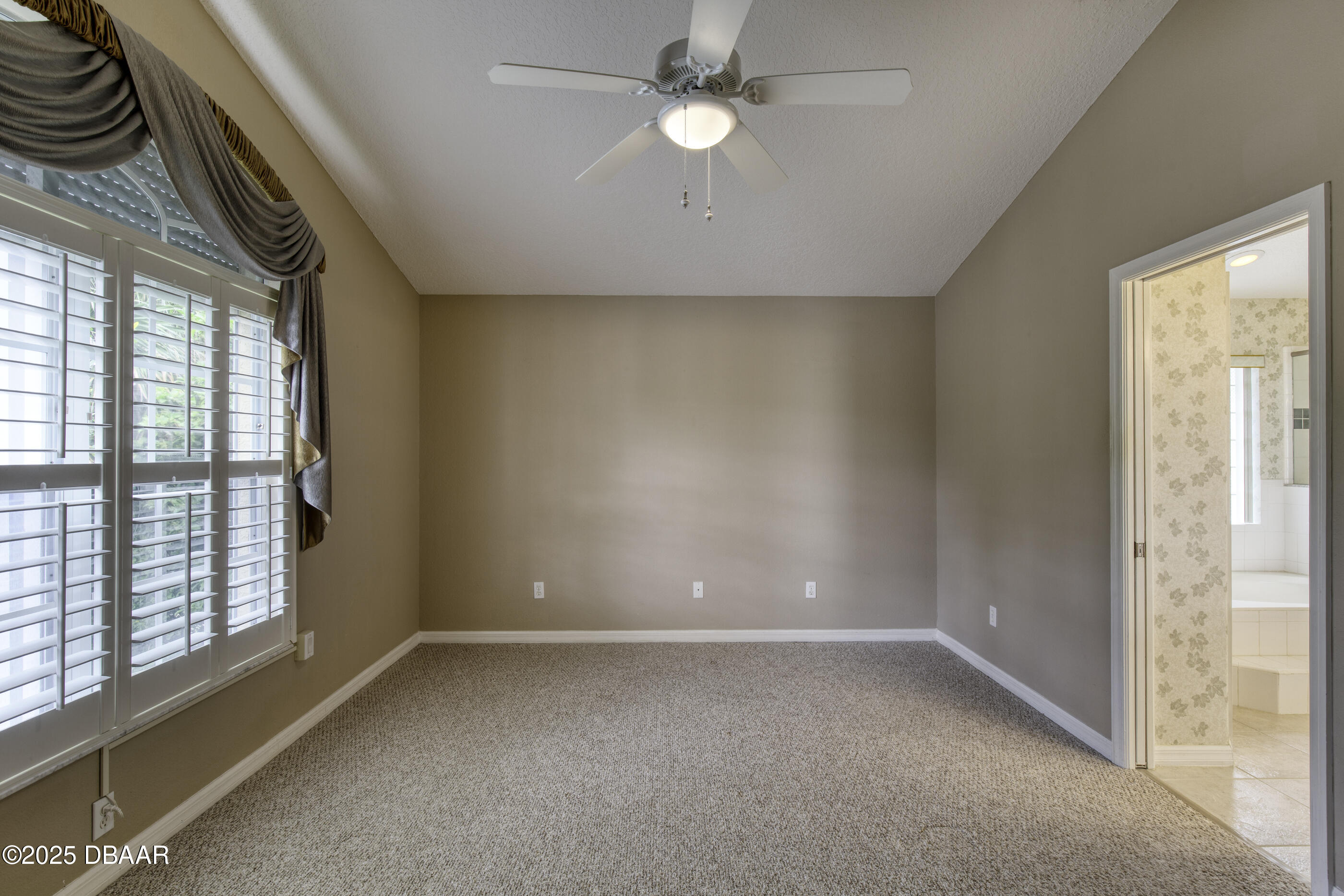 38 Lake Walden Trail Ormond Beach, FL 32174 - Photo 39 of 72 a view of an empty room with a window